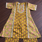 Mustard panelled A-line kurta with block print straight pants