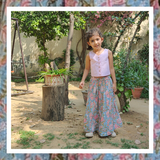 floral printed cotton lurex lehenga paired with a striped sleeveless blouse