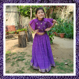 Purple bandhani lehenga with gota detailing paired with choli with gota patti flowers.