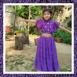 Purple bandhani lehenga with gota detailing paired with choli with gota patti flowers.