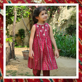 Red floral sleeveless pleated kurta with gota patti flowers paired with straight pants